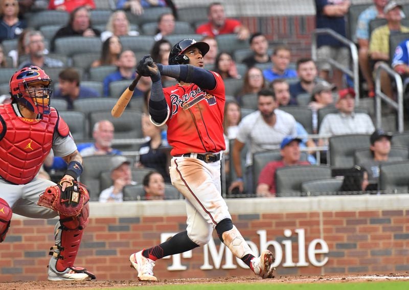  Braves second baseman Ozzie Albies hits a home run in the second inning at Truist Park on Friday, June 18, 2021. (Hyosub Shin / Hyosub.Shin@ajc.com)