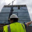 Travis Garland, managing director of Portman Holdings, gives a tour of 1020 Spring, one of the few office high-rises under construction in metro Atlanta, in Midtown on Tuesday, May 7, 2024. (Arvin Temkar / AJC)