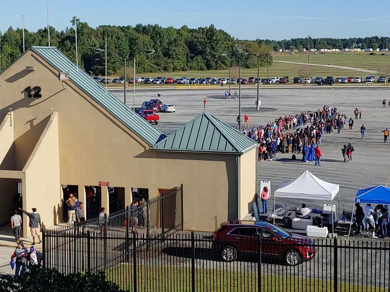 Crowds line up at the Atlanta Motor Speedway for the first day of the Atlanta Air Show on Saturday, Oct. 13, 2018. 