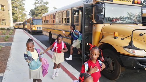 Atlanta Public Schools students arrive for the  first day of the 2019-2020 school year at Tuskegee Airmen Global Academy. (Bob Andres / AJC FILE PHOTO)