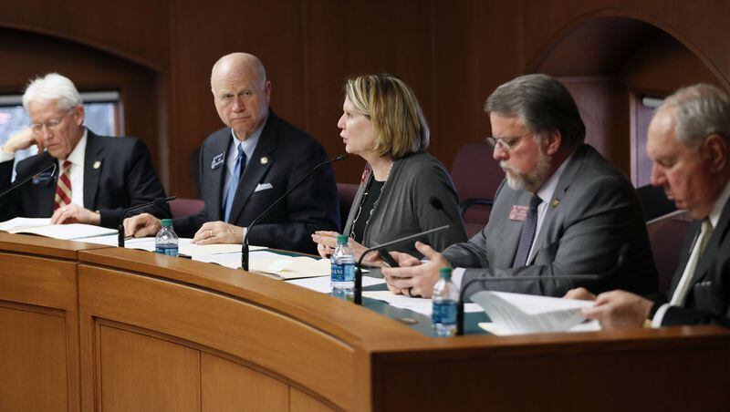 2/15/18 - Atlanta - Rep. Jan Jones (center), R - Milton, the lone woman on the committee, recommends the adoption of the new policy to the Legislative Services Committee. Georgia legislators will be required to get training every other year on sexual harassment, according to a new policy passed by a committee vote Thursday. But harassment complaints would remain confidential, BOB ANDRES /BANDRES@AJC.COM
