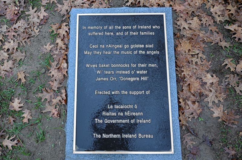 In October, officials unveiled a plaque honoring the Irish Americans buried at Andersonville National Cemetery. The Irish government and the Northern Ireland Bureau funded the monument and sent representatives to speak at its dedication. Written in English, Irish and Ulster Scots, it reads: “In memory of all the sons of Ireland who suffered here, and their families. May they hear the music of the angels.” It also quotes from “Donegore Hill,” a famous piece by Irish poet James Orr: “Wives baked bonnocks for their men, with tears instead of water.” (Hyosub Shin / Hyosub.Shin@ajc.com)