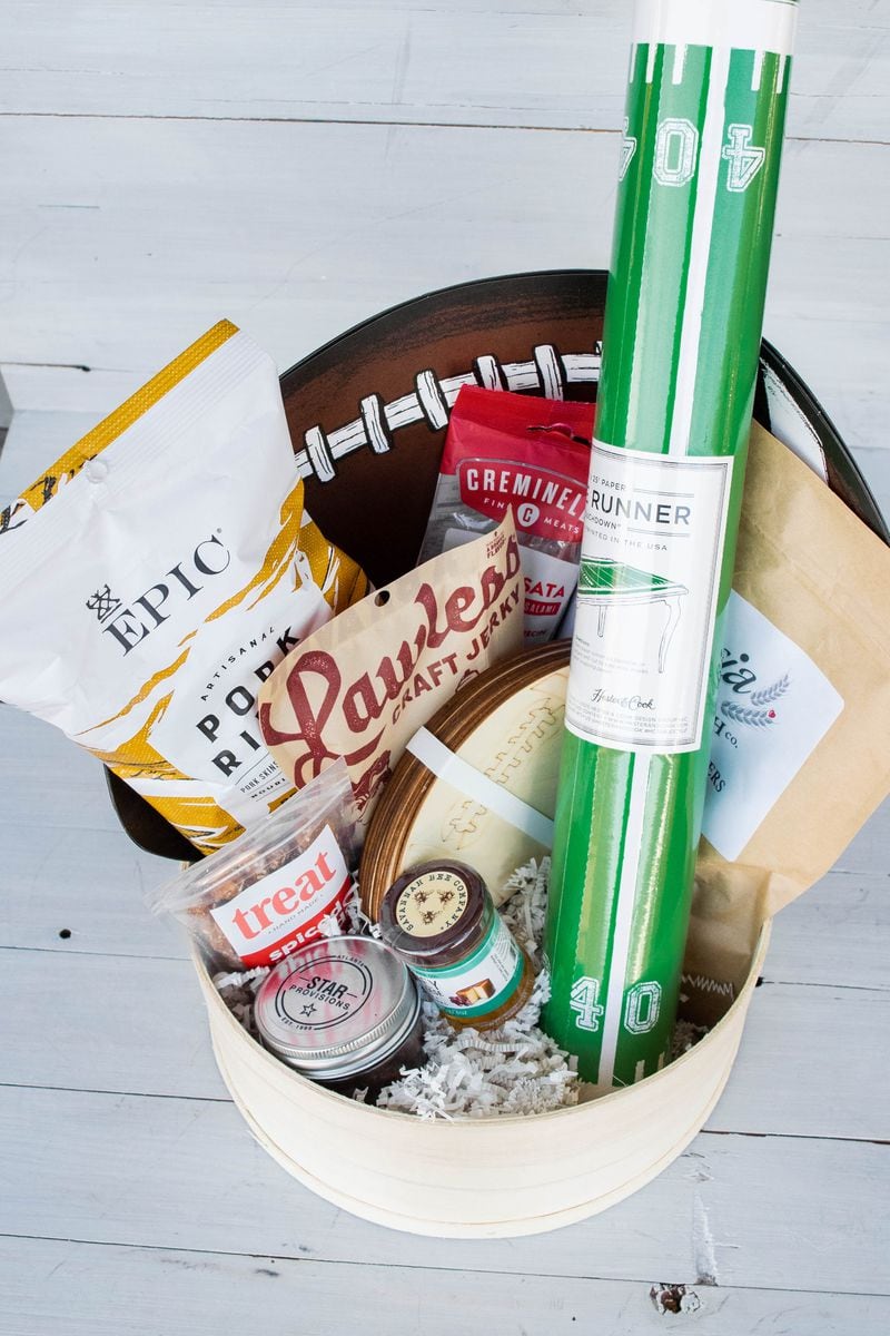 Take home  Star Provisions' Pigskin Basket, full of snacks and decor for your own watch party.