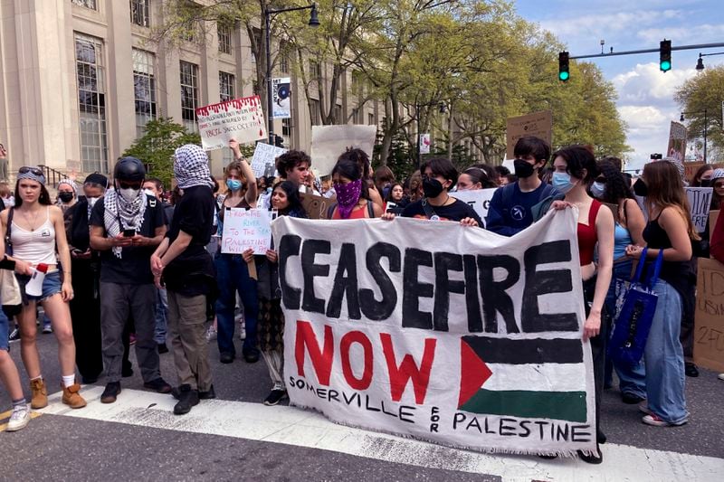 Pro-Palestinian protestors stand on Massachusetts Avenue near a student encampment on the campus of the Massachusetts Institute of Technology, after a 2:30pm deadline passed to leave the encampment, Monday May 6, 2024, in Cambridge, Mass. (AP Photo/Steve LeBlanc)