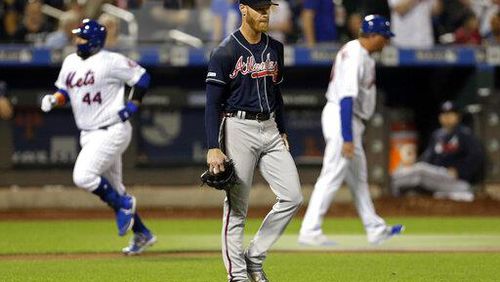 Atlanta Braves pitcher Mike Foltynewicz reacts after giving up a two-run home run to New York Mets' Rene Rivera (44) during the third inning of a baseball game, Saturday, Sept. 28, 2019, in New York. (AP Photo/Adam Hunger)