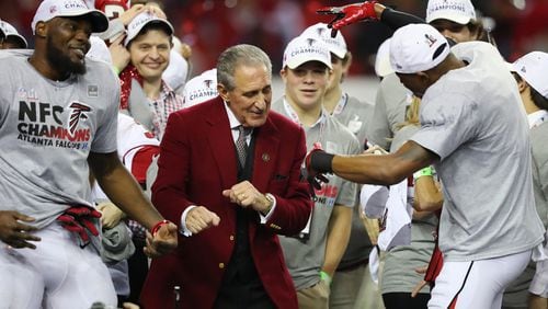 Falcons owner Arthur Blank shows he has moves after the team beat the Packers, Jan. 22, 2017, in Atlanta to go to the Super Bowl.