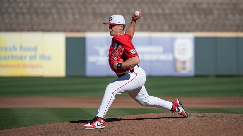 Bulldogs pitcher Nolan Crisp delivers during the 20th Spring Classic against Georgia Tech on Sunday at Coolray Field in Lawrenceville. (Jamie Spaar / for The Atlanta Journal-Constitution)