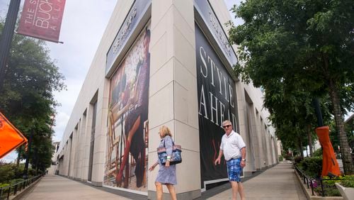 05/15/2018 -- Atlanta, GA -- Pedestrians walk through The Shops Buckhead Atlanta located in Atlanta's Buckhead community, Tuesday, May 15, 2018. In the four years since the Shops Buckhead Atlanta transitioned from a hole in the ground to a high-end shopping destination, it has struggled to find its footing ALYSSA POINTER/ATLANTA JOURNAL-CONSTITUTION