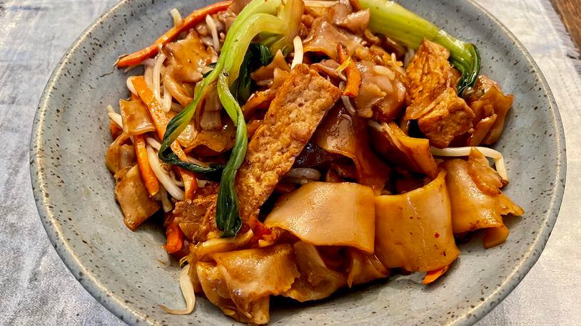 Chow kway teow at Mamak Vegan Kitchen includes rice noodles, carrots, bok choy, tofu and bean sprouts. Angela Hansberger for The Atlanta Journal-Constitution