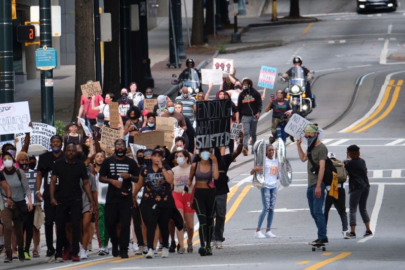 A crowd marched through downtown Atlanta in protest of police brutality and racism Tuesday afternoon.