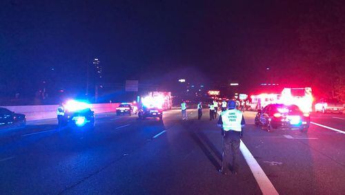 Police said the woman was illegally riding her moped on I-285 when she was struck and killed.