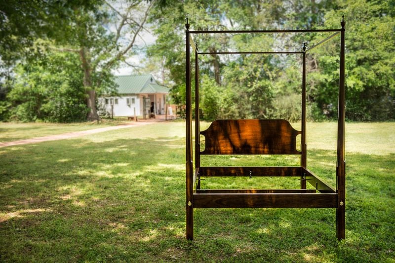 A mahogany four-poster bed designed by former President Jimmy Carter and created by master furniture maker Andrew Reid will be auctioned off on June 24 during the annual Carter Center Weekend. Photo by Katie Archibald-Woodward