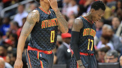 102715 ATLANTA: -- Hawks guards Jeff Teague (left) and Dennis Schroder head to the locker room trailing the Pistons at the half in their first regular season basketball game "home opener" on Tuesday, Oct. 27, 2015, in Atlanta. Curtis Compton / ccompton@ajc.com