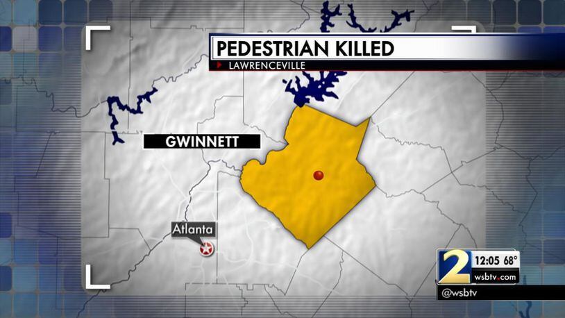 Gwinnett County police are trying to identify a man struck and killed by a car Saturday at Lawrenceville Highway south of Sugarloaf Parkway. (Credit: Channel 2 Action News)