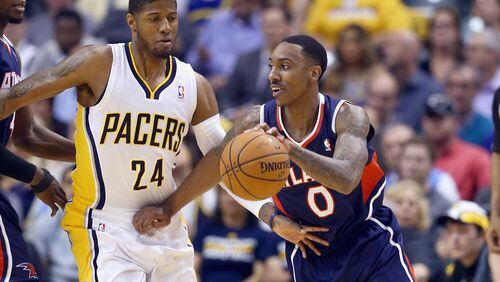 Paul George of the Indiana Pacers defends Jeff Teague of the Atlanta Hawks in Game 2 of the Eastern Conference Quarterfinals during the 2014 NBA Playoffs at Bankers Life Fieldhouse on April 22, 2014 in Indianapolis. (Photo by Andy Lyons/Getty Images)
