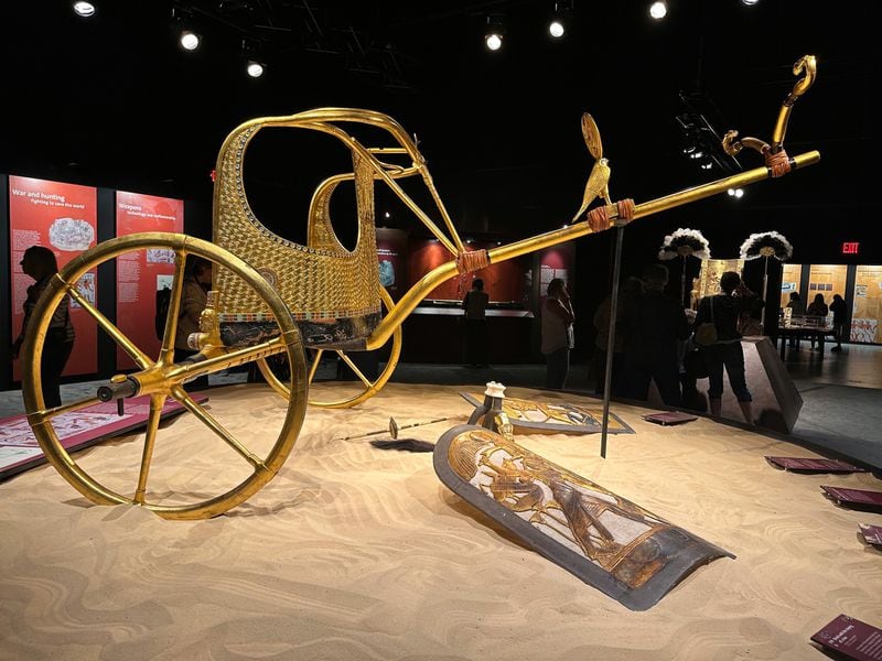 A replica of one of King Tut's ceremonial chariots found by Howard Carter in 1922 at the King Tut exhibit at Exhibition Hub in Doraville. RODNEY HO/rho@ajc.com
