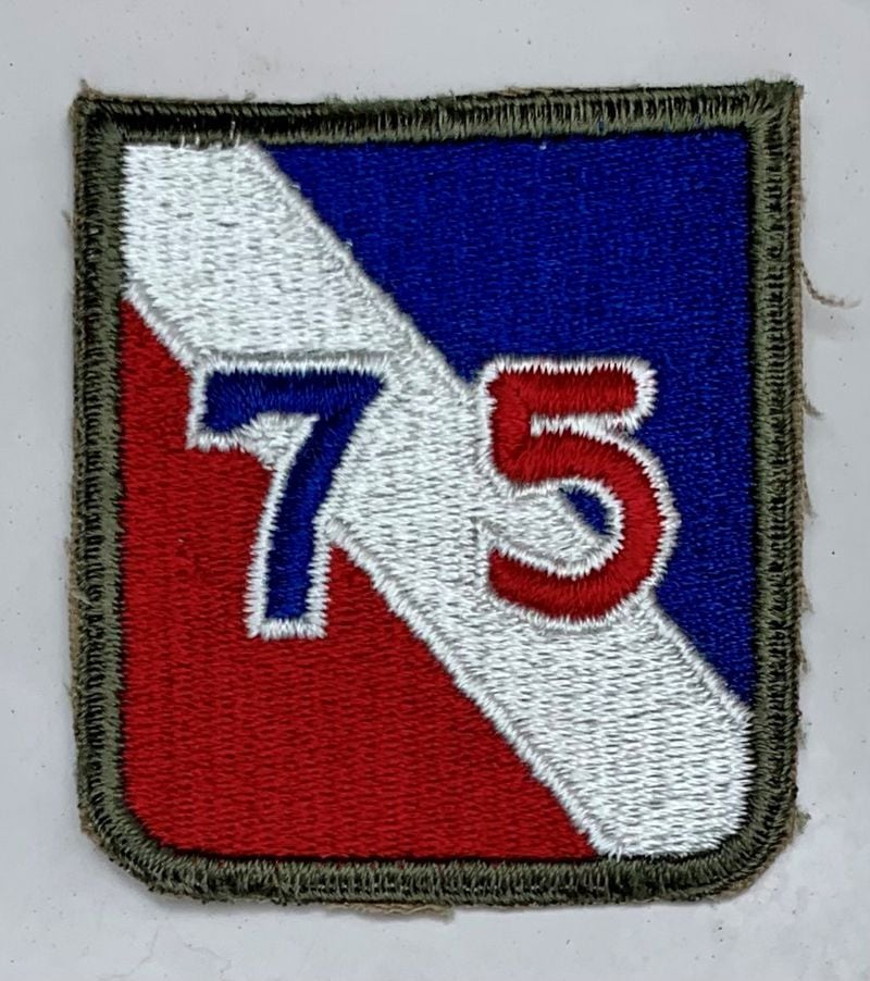 A patch of the Army’s 75th Infantry Division, which landed at Le Havre, France on Dec. 14, 1944 during World War II, said Tom Dworschak. The group was nicknamed the “diaper division,” he said because of their average age of 21. His father, Walter, was a member of the division.