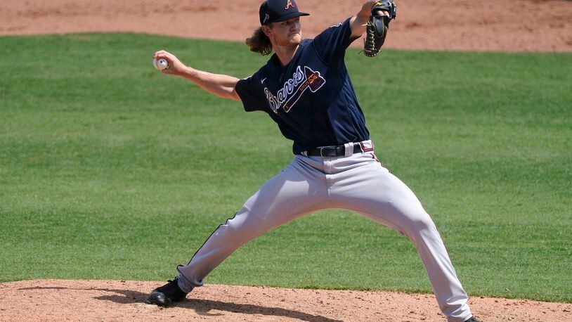 Atlanta Braves starting pitcher Mike Soroka (40) works in the seventh inning of a spring training baseball game against the Boston Red Sox Tuesday, March 30, 2021, in Fort Myers, Fla. Soroka was making his first appearance of the spring after tearing his Achilles tendon last August. (AP Photo/John Bazemore)
