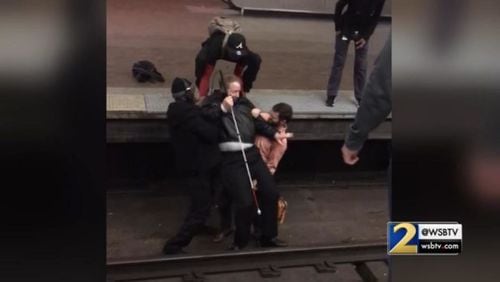 Good Samaritans rescue man from tracks at the Five Points MARTA station.