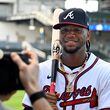 Atlanta Braves right fielder Ronald Acuña Jr. poses for team photographer Kevin D. Liles during the team's photo day at CoolToday Park, Friday, Feb. 23, 2024, in North Port, Florida. (Hyosub Shin / Hyosub.Shin@ajc.com)