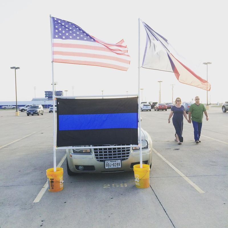 Supporters arrive at a vigil for Brent Thompson in July 2016 in Corsicana, Tex, several days after he and four other law enforcement officers were shot to death in Dallas. Photo: Jennifer Brett