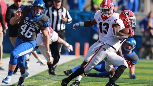 Georgia wide receiver Mecole Hardam makes a long punt return setting up a touchdown drive against Kentucky during the first quarter in a NCAA college football game on Saturday, Nov. 3, 2018, in Lexington.  Curtis Compton/ccompton@ajc.com