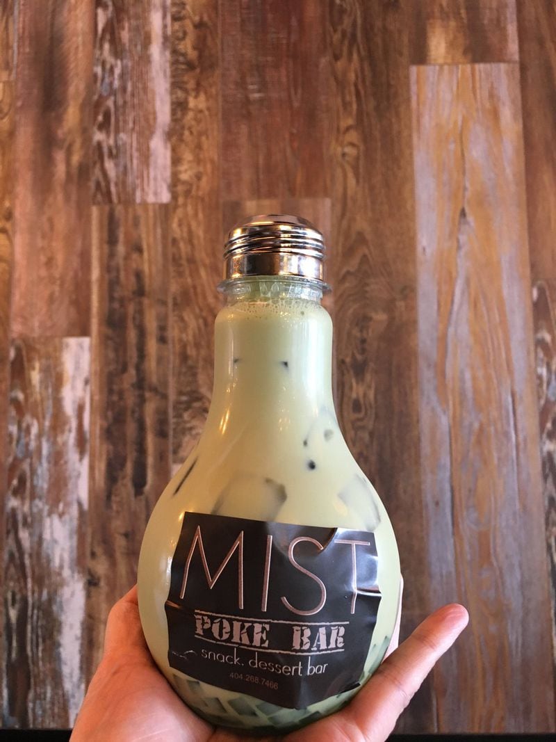 Among the trendy beverages at Mist Poke Dessert Bar is a matcha green tea with green tea jelly served in a light bulb. CONTRIBUTED BY ANGELA HANSBERGER