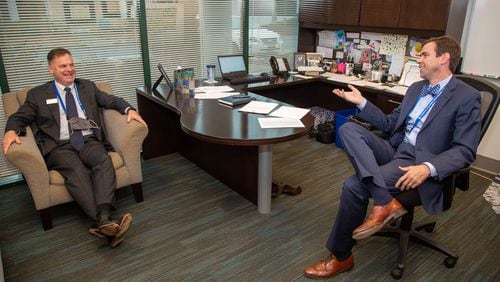 Middle School Principal Dr Kevin Jenkins (left) chats with Headmaster Colin Creel in his office at Cornerstone Christian Academy in Peachtree Corners on Monday January 25th, 2021 For a story on the Top Workplace small category. PHIL SKINNER FOR THE ATLANTA JOURNAL-CONSTITUTION.