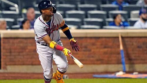 Ronald Acuña follows through on his fifth-inning home run during Monday's Game 2 of a doubleheader against the Mets.