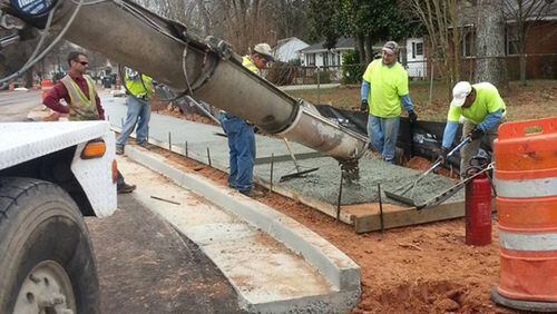 Alpharetta has awarded a contract to construct two sidewalk segments along North Point Court and Hembree Road. AJC FILE