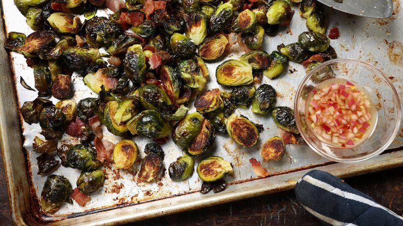 Roasted Brussels sprouts with bacon are served with a simple sweet and sour vinaigrette. Styling by Joan Moravek. (Abel Uribe/Chicago Tribune/TNS)