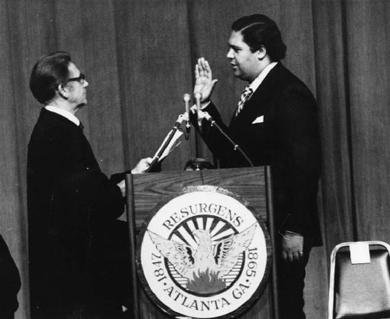 Judge Luther Alverson administers the oath of office to Atlanta Mayor Maynard Jackson on Jan. 7, 1974. As mayor, Jackson demanded black-owned firms be included in lucrative city contracting. That access to the halls of power helped shape Atlanta’ black middle class — and an unbroken string of black mayors. AJC archives photo/Charles Pugh