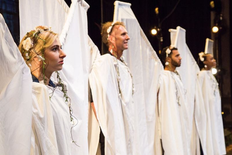In Theatrical Outfit’s “The Laramie Project,” a brigade of angels (played by Maggie Birgel, Jayson Warner Smith, Curtis Lipsey, and Asia Howard) turns out to block an anti-gay protester. Photo Credit: Casey Gardner Photography