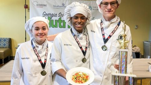 Students in the culinary arts program at Gwinnett's Maxwell High School have qualified for a regional competition in Kentucky. Pictured from left: Angélica Burgos, De’Avion Frezell, and Preston Gouge