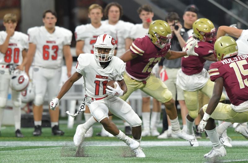 August 18, 2018 Atlanta - North Gwinnett wide receiver Josh Downs (11) makes a move after a catch in the second half during the Corky Kell Classic at Mercedes-Benz Stadium on Saturday, August 18, 2018. North Gwinnett won 37-2 over the Brookwood. HYOSUB SHIN / HSHIN@AJC.COM