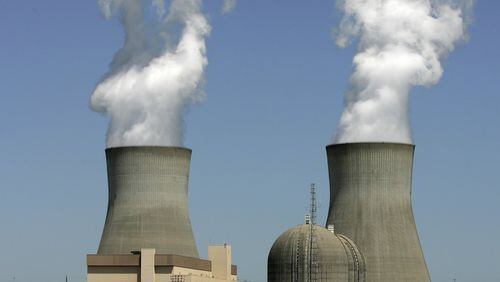 Steam rises from the cooling towers of nuclear reactors at Georgia Power’s Plant Vogtle, which is being expanded. (AP Photo/Mary Ann Chastain, File)