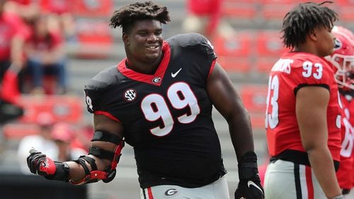 041721 Athens: Georgia defensive lineman Jordan Davis gets his groove on during the G-Day game at Sanford Stadium on Saturday, April 17, 2021, in Athens.   “Curtis Compton / Curtis.Compton@ajc.com”