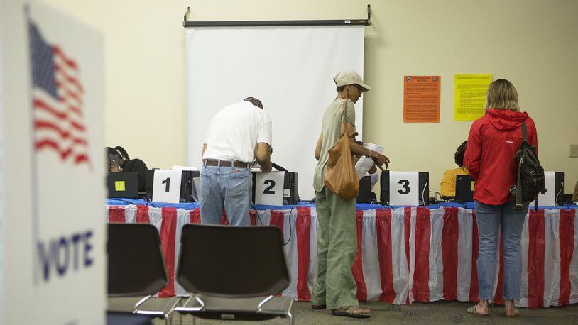 Voters turn out at the Roswell Branch Public Library to cast the ballots early in the 6th Congressional District special runoff election on Monday June 5th 2017. (Photo by Phil Skinner)