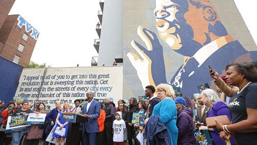 Democratic nominee for U.S Senate Sen. Raphael Warnock speaks at the site of the John Lewis mural, Thursday, November 10, 2022, in Atlanta. Warnock is in a runoff with republican nominee Herschel Walker on Dec. 6, 2022. (Jason Getz / Jason.Getz@ajc.com)