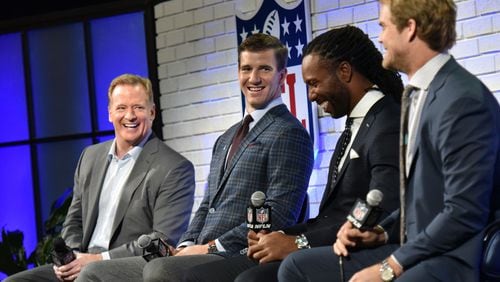 NFL Commissioner Roger Goodell, left, and players Eli Manning, Greg Olsen and Larry Fitzgerald, discussed topics including patriotism with fans. AJC photo: Hyosub Shin