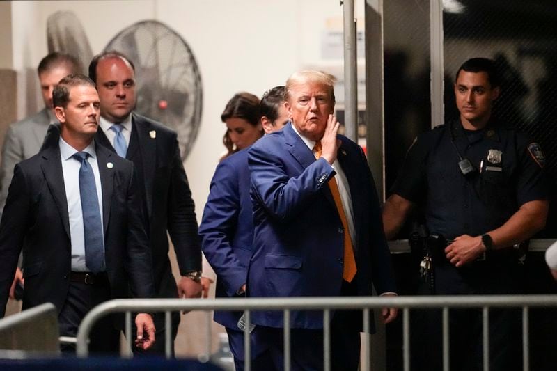 Former President Donald Trump speaks to reporters as he returns to the courtroom following an afternoon break in his trial, Tuesday, May 7, 2024, in New York. (AP Photo/Mary Altaffer, Pool)