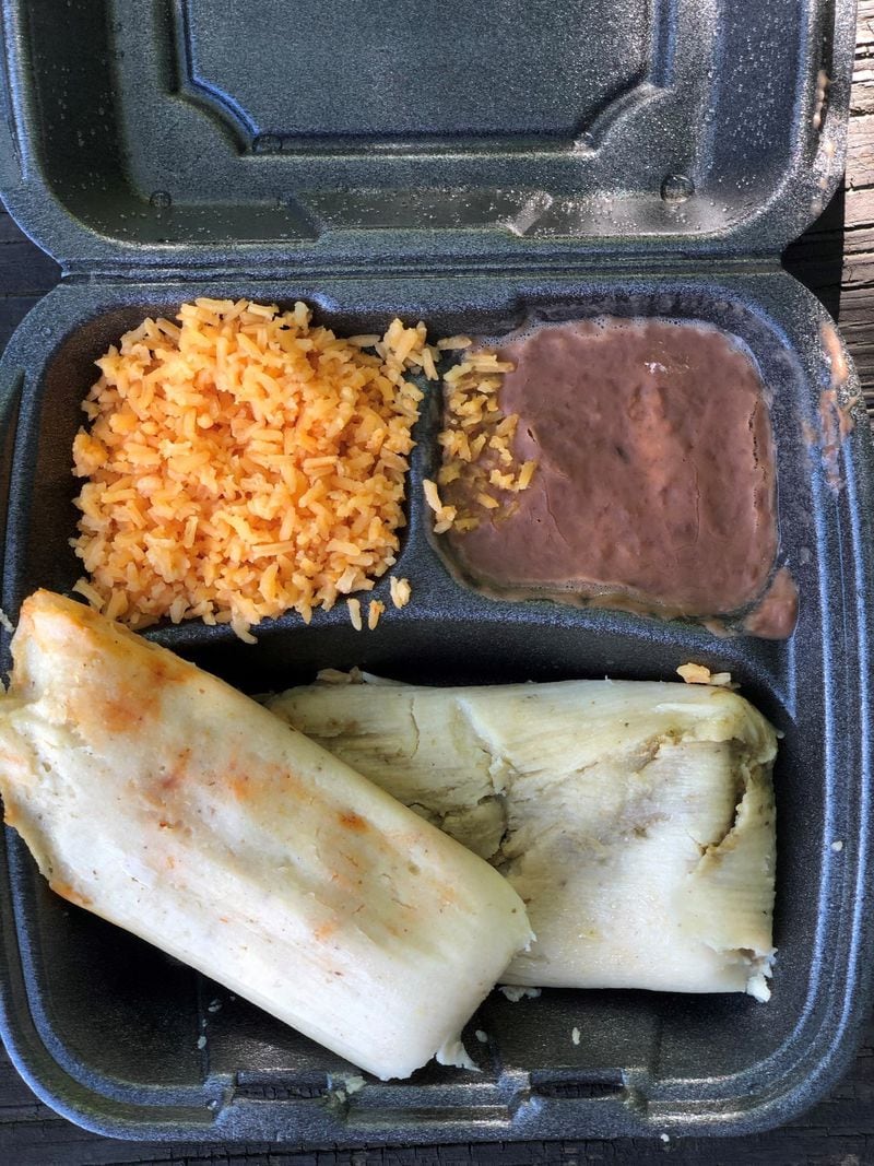 A tamale plate at La Mixteca in Suwanee includes wonderful Mexican rice and refried beans. Shown here are the red chicken and green chicken tamales. CONTRIBUTED BY WENDELL BROCK