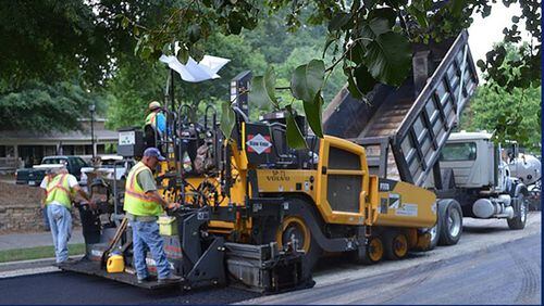 A Johns Creek contractor has finished repaving neighborhood streets in 16 subdivisions and nine main roads, the city announced.