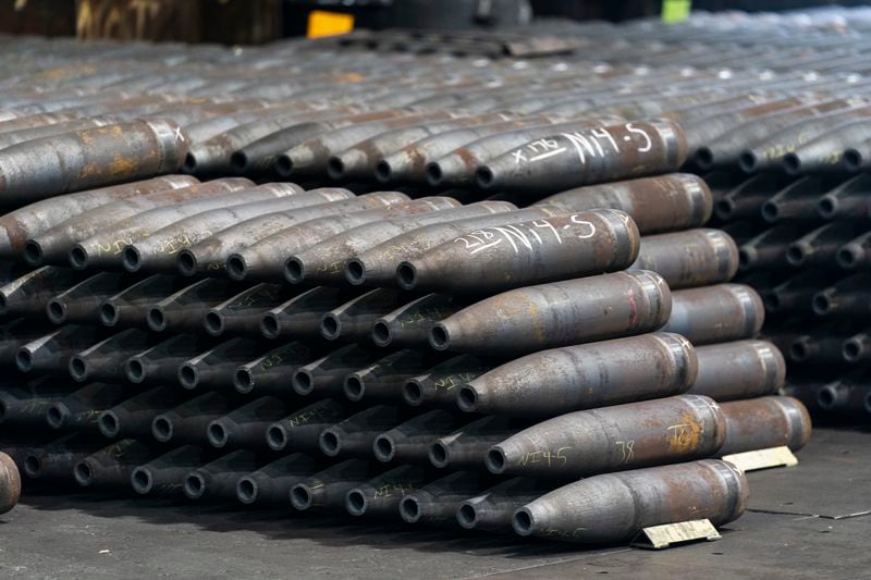 FILE -155 mm M795 artillery projectiles are stacked during manufacturing process at the Scranton Army Ammunition Plant in Scranton, Pa., Thursday, April 13, 2023. The Pentagon could get weapons moving to Ukraine within days if Congress passes a long-delayed aid bill. That's because it has a network of storage sites in the U.S. and Europe that already hold the ammunition and air defense components that Kyiv desperately needs. Moving fast is critical, CIA Director Bill Burns said Thursday, April 18, 2024. (AP Photo/Matt Rourke, File)