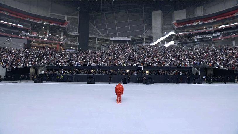 Kanye West appears on a white field at Mercedes-Benz Stadium to preview his upcoming album "Donda."