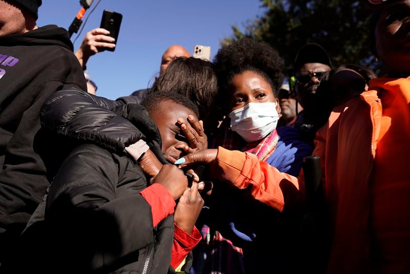 People react outside the Glynn County Courthouse in Brunswick, Ga., on Wednesday, Nov. 24, 2021, after the jury found three men guilty of murder and other charges for the pursuit and fatal shooting of Ahmaud Arbery. (Nicole Craine/The New York Times)
