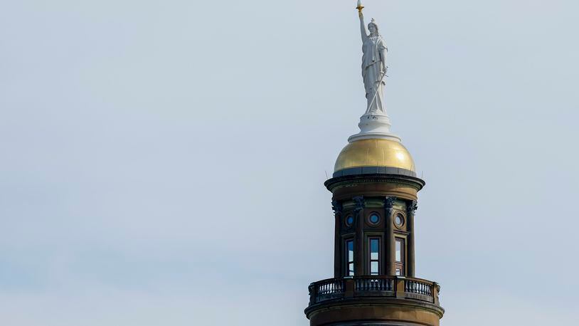 The top of the Georgia State Capitol building is shown, Tuesday, February 7, 2023, in Atlanta. Jason Getz / Jason.Getz@ajc.com)