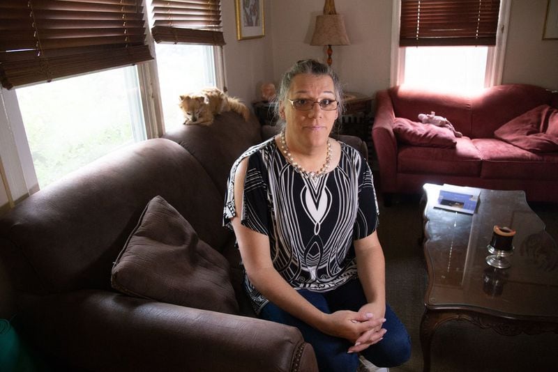 Former Byron, Ga., fire chief Rachel Mosby poses for a photograph in her Decatur home on June 29, 2020. Mosby, who is transgender, filed a discimination suit against her former employer earlier this year. STEVE SCHAEFER FOR THE ATLANTA JOURNAL-CONSTITUTION