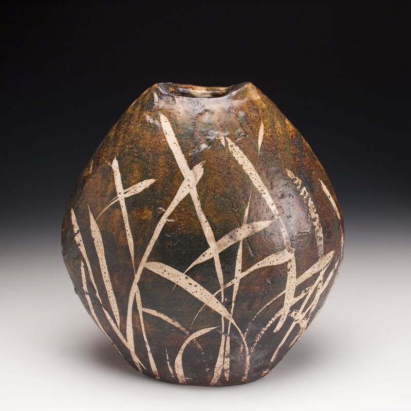 Michael Hunt and Naomi Dalglish of North Carolina partner in creating works, such as this wood-fired stoneware vase, that will be shown and for sale during Designed + Crafted, Oct. 2-4 at the Westside Provisions District.