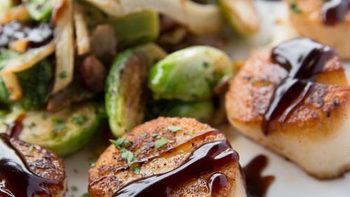 At Zeal Kitchen and Bar, try the diver scallops, served with crispy Brussels sprouts in a balsamic brown butter sauce.